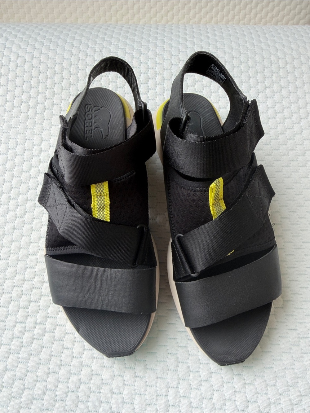 Sorel Black Sandals with Yellow Pull-Tab Accent